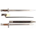 A Spanish M1893 bayonet, chequered grips, in scabbard (leather limp); a P1907 bayonet, stamps at
