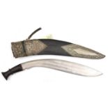 An old kukri, double shallow fullered blade 15½”, with short back fuller, darkwood grip with
