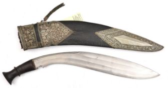 An old kukri, double shallow fullered blade 15½”, with short back fuller, darkwood grip with