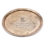 A silver plated white metal tray, 9” diameter, engraved with eagle’s head, SS runes, and 1939 Iron