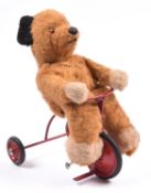 A scarce Chiltern 'Bear on a Tricycle' designed by Pamela Howells in 1958. (CB1-0669). A small straw