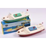 2 Sutcliffe clockwork tinplate boats. A HAWK speed boat/motor launch. In white and green, complete