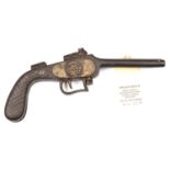 A 19th century cast iron novelty folding boot jack, in the form of a double barrelled pistol, 8”