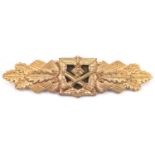 A Third Reich Army Close Combat clasp, in gold. This appears to be the special pattern with