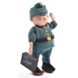 A rare 1930's German walking mechanical soldier 'Private Shenk'. 21cm in height, wearing a felt