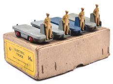 A scarce Dinky Toys Trade Pack for '6 Electric Truck 14A'. Containing 4 examples, 3 in shades of