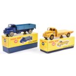 2 Dinky Toys Leyland Comet Lorries. A Comet Wagon with hinged tailboard (418). An example in dark