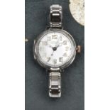 A WWI officer’s silver Rolex Trench watch, the dial with retailer’s name “Garmon, Torquay” (worn),
