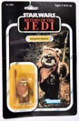 A Kenner Star Wars Return of the Jedi Wicket W. Warrick vintage 3.75" figure. On a sealed 1984 79