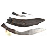 An old kukri, blade 12”, short double back fuller, darkwood grip with raised central band, with