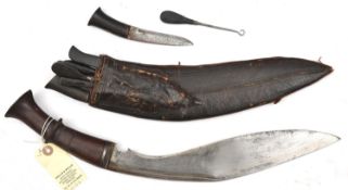 An old kukri, blade 12”, short double back fuller, darkwood grip with raised central band, with