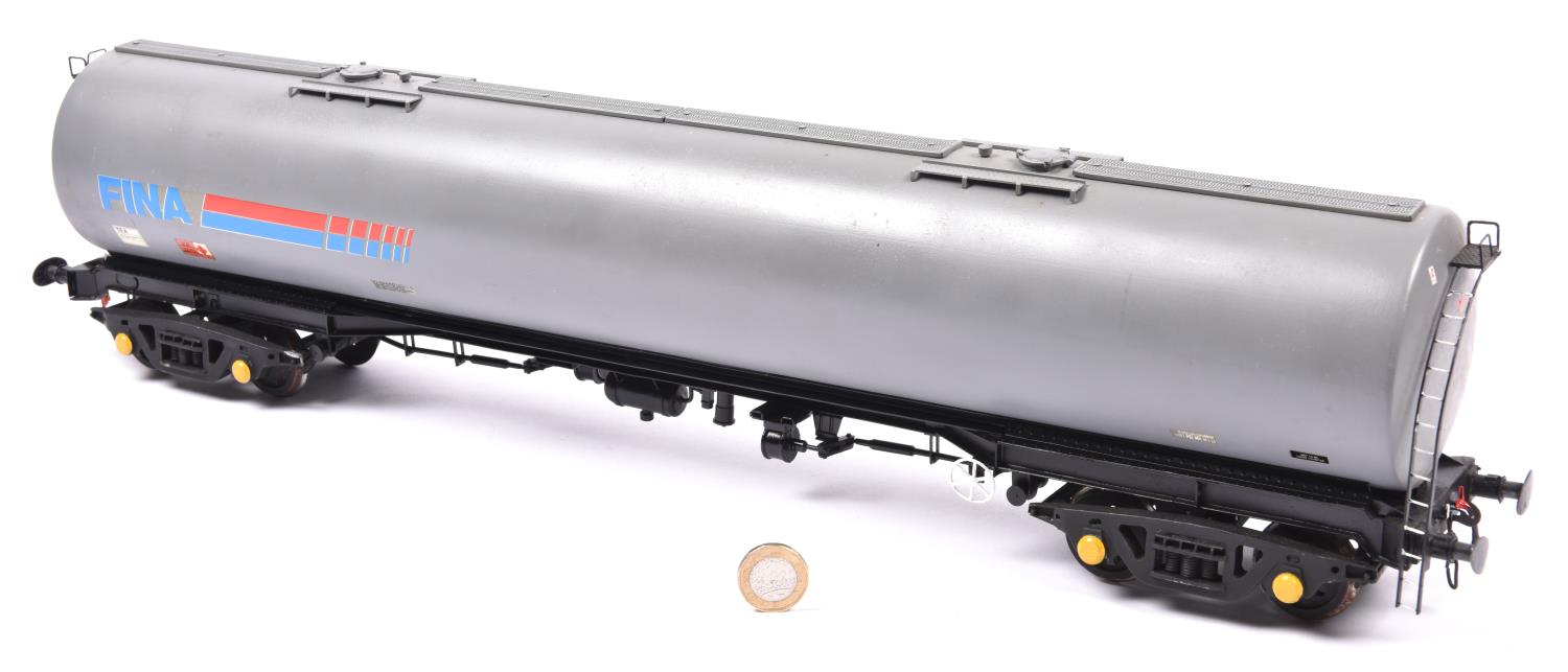 A Gauge One, 45mm, TEA 100 ton bogie tanker wagon constructed from an RJH kit. 'FINA', in grey