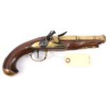 A late 18th century French brass cannon barrelled flintlock travelling pistol, 11” overall, 2