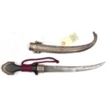 A Moroccan jambiya, c 1900, curved blade 9”, DE at point, polished dark wood grip, with crimson cord