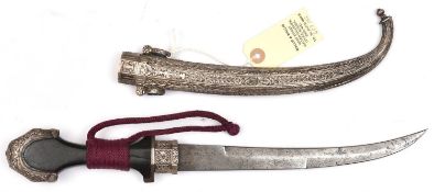 A Moroccan jambiya, c 1900, curved blade 9”, DE at point, polished dark wood grip, with crimson cord