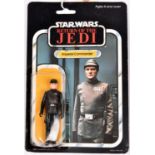 A Palitoy Star Wars Return of the Jedi Imperial Commander vintage 3.75" figure. On a sealed 1983