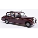 A Spot-On Royal Rolls Royce. In deep maroon with light blue interior, complete with shield,