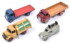 4 Dinky Toys. Big Bedford Lorry with maroon chassis & cab, fawn body & wheels. Guy Flatbed with