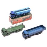 3 Dinky Supertoys Foden Trucks. A 1st series Wagon (501) in dark blue with silver flash, black