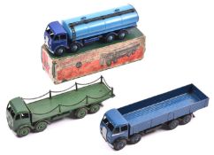 3 Dinky Supertoys Foden Trucks. A 1st series Wagon (501) in dark blue with silver flash, black