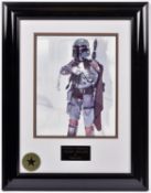 A Star Wars framed photograph of Boba Fett with signed autograph by actor Jeremy Bulloch. In gloss