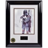 A Star Wars framed photograph of Boba Fett with signed autograph by actor Jeremy Bulloch. In gloss