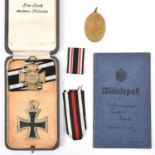 A 1914 Iron Cross 2nd Class; 1914-1918 Honour Cross with swords, and Kyffhauserbund medal, contained