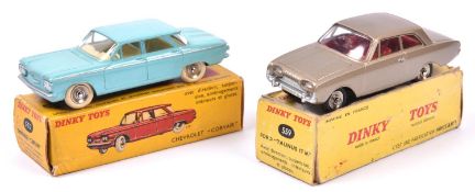 2 French Dinky Toys. Chevrolet Corvair (552) in turquoise with cream interior, dished spun wheels