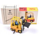 A scarce Dinky Toys Promotional Model. A Conveyancer Fork Lift Truck (404) in yellow and orange