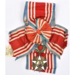 Liberia: Order of African Redemption sash and sash badge, in gilt with 5 pointed white enamelled