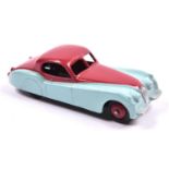 Dinky Toys Jaguar XK120. An example in cerise and light turquoise with red wheels and black tyres.