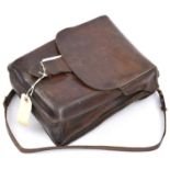 A WWII Imperial Japanese Army or Air Force flap top leather map case, with shoulder strap and belt