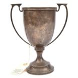 A two handled silver prize cup, engraved “Lewes Miniature Rifle Club, The Edward A. Glover Cup,