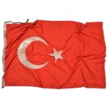 A white on red double sided flag with applied Ottoman star and crescent, the hoist stamped with