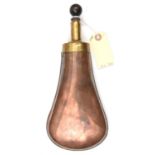 A large plain copper reservoir (?) flask, brass top with ¾” diam. nozzle and darkwood stopper, 11”