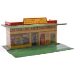 A Dinky Toys Filling and Service Station (48). A tinplate station with green base and roof. QGC-