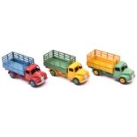 3 Dinky Toys Dodge Farm Produce Wagons (343). 3 examples, cab and chassis in yellow with mid green