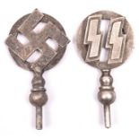 2 small Third Reich grey metal standard tops (?), circular, one with swastika, the other with SS