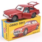 Corgi MGB GT (327). In deep red with mid blue interior, spoked wheels and black tyres, with black