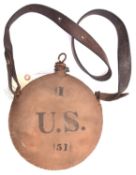A 19th century US brown canvas covered water bottle, stamped I/U.S./51 of circular form with leather