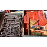 A quantity of Hornby O gauge tinplate railway. Including 11x boxed freight wagons and 4-wheel