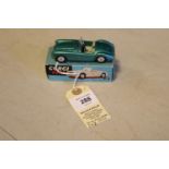 Corgi Toys M.G.A. Sports Car (302). In metallic green with cream seats, smooth spun wheels and