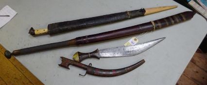 A 20th century Burmese dha, with brass mounted wire bound grip, in its scabbard (split); a Khyber