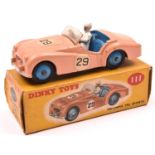 Dinky Toys Triumph TR2 Sports (111). An example in salmon pink, with mid blue interior and wheels,