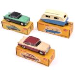 3 Dinky Toys. 2x Humber Hawk (165) in maroon and cream. Plus another in light green and black,