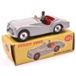 Dinky Toys Triumph TR2 (105). A scarce 'Touring' finish example in light grey with red interior,