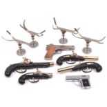 20 plated metal adjustable stands for displaying pistols etc.