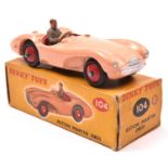 Dinky Toys Aston Martin DB3S (104). A scarce example in salmon pink with red seats and wheels,