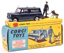 Corgi Toys B.M.C. Mini Police Van - with tracker dog (448). Van in dark blue with red interior,