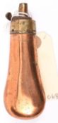 A plain copper bag shaped pistol size powder flask, sprung brass top and nozzle, 4½” overall. GC
